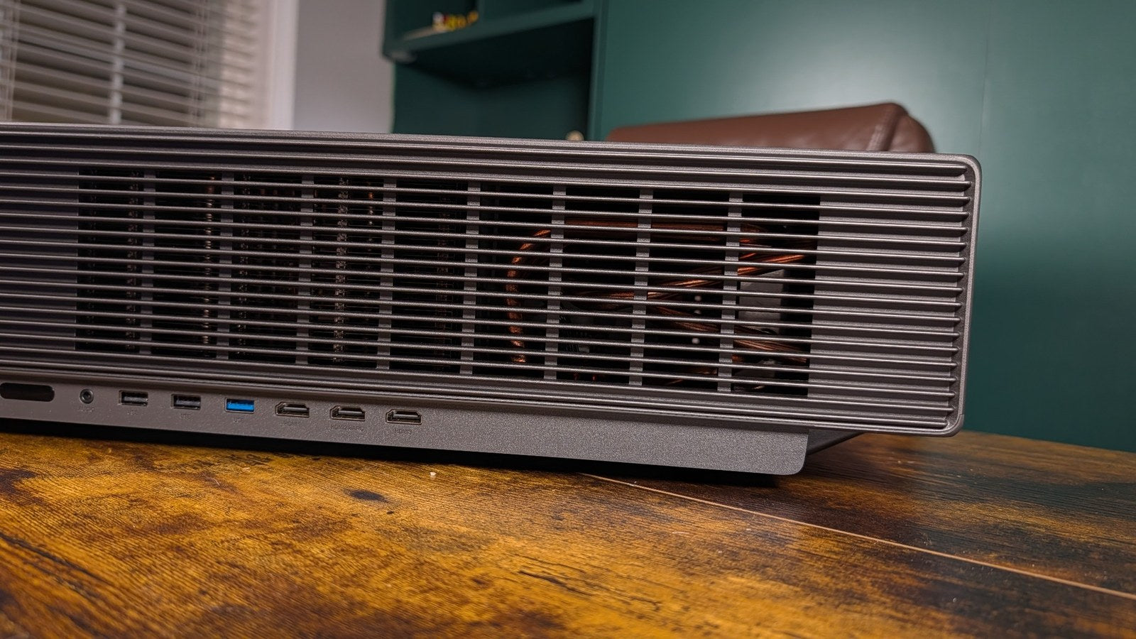 Rear grille of the XGIMI Aura 3 Max with copper cooling hardware visible inside